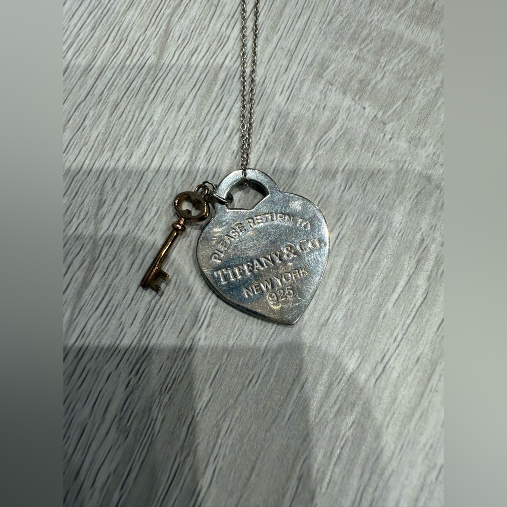 Tiffany & Co. Silver Heart Tag Necklace with Gold Key Charm